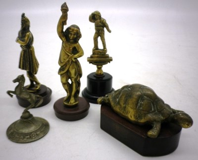 Lot 46 - Five brass mascots