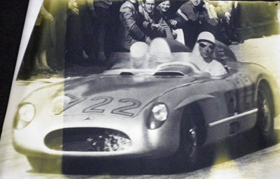 Lot 25 - Stirling Moss Banner / Chequered flag