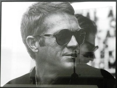 Lot 128 - Framed B&W - Steve McQueen Persol glasses