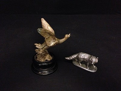 Lot 027 - Two motoring mascots