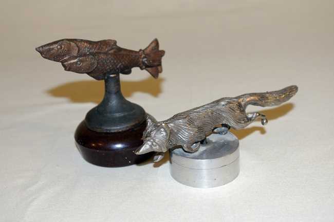 Lot 45 - Two motoring mascots