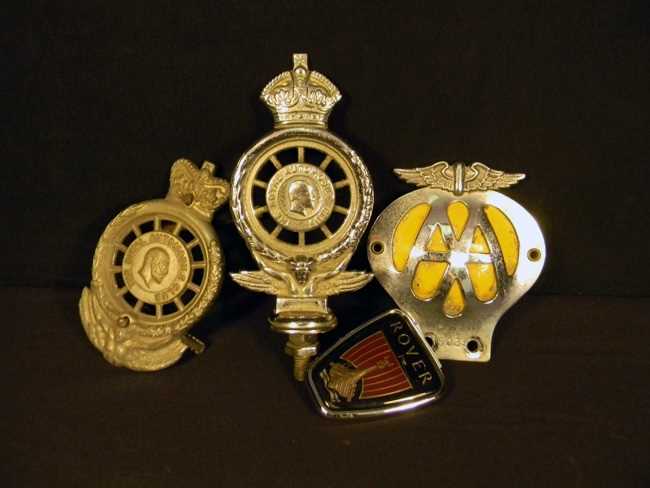 Lot 48 - 4 car badges