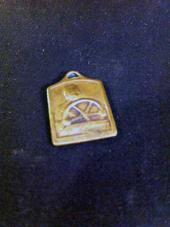 Lot 13 - bronze watch fob