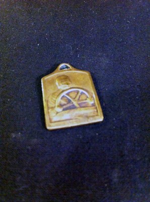 Lot 013 - bronze watch fob