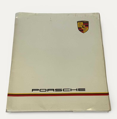 Lot 144 - Porsche Sleeve with Brochures