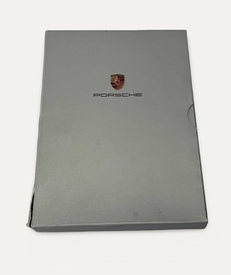 Lot 143 - 2004 Porsche Range Price List & DVD