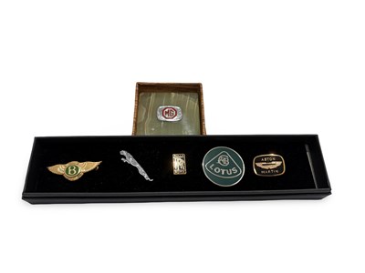 Lot 47 - MG Showroom Paperweight and Five Enamelled Lapel Badges