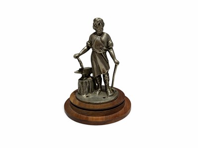 Lot 92 - An early Vulcan " Blacksmith " Radiator Mascot