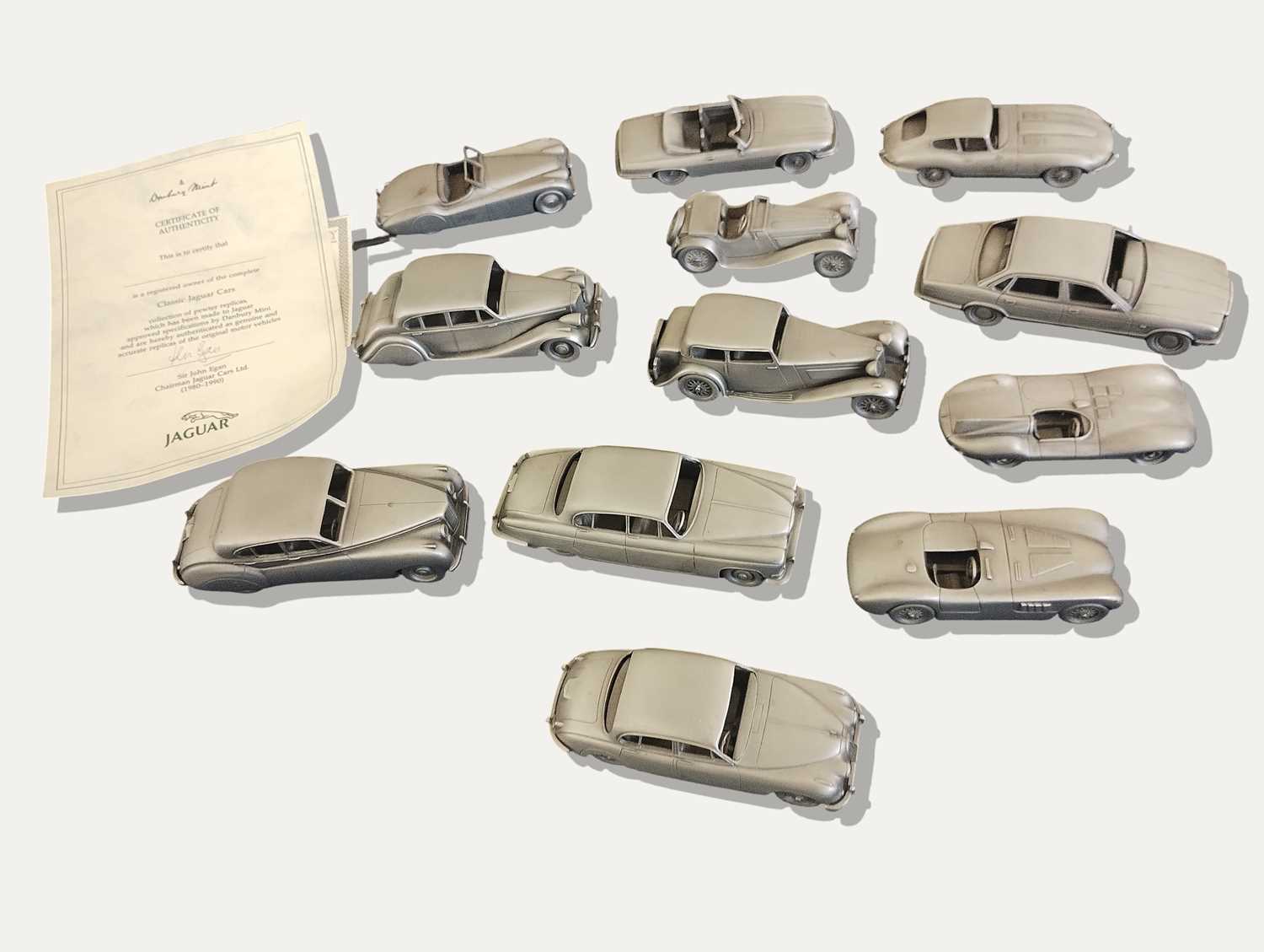 Lot 12 - Collection of 12 Danbury Mint Pewter Cars