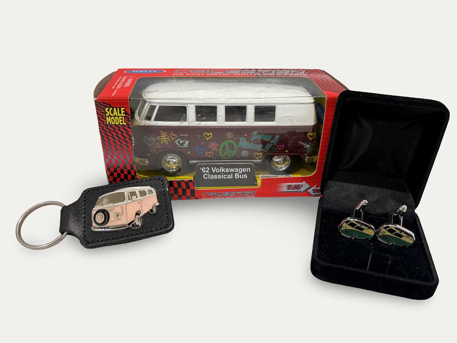 Lot 82 - Volkswagen Cufflinks, Key Fob and Model