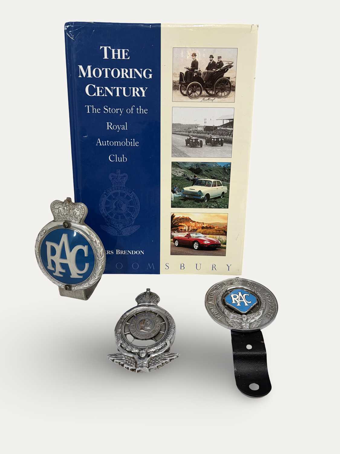 Lot 25 - “The Story of the Royal Automobile Club " by Piers Brendon RAC Badges