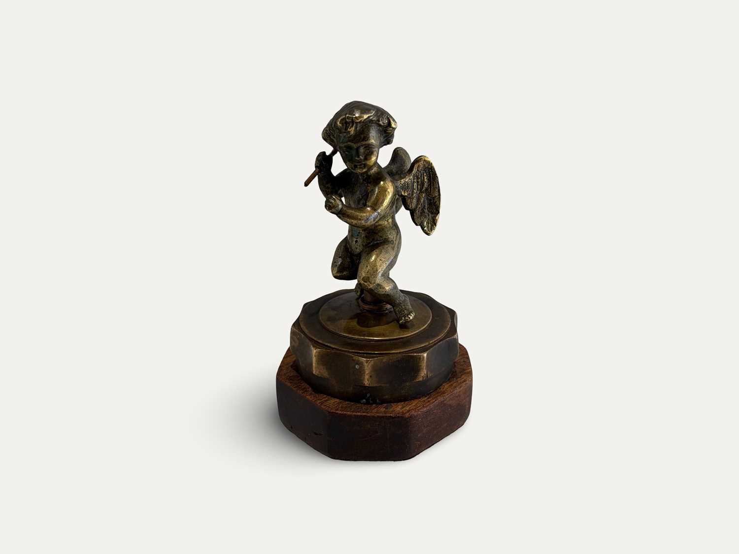 Lot 44 - A Early Edwardian Brass ‘Cherub’ Radiator Mascot