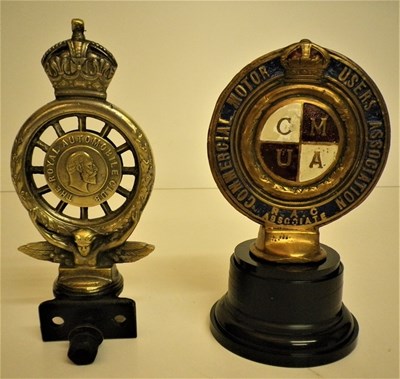 Lot 87 - A Rolls-Royce hip flask, a miniature ‘Spirit of Ecstasy’, a Bentley hip flask and a Bentley cigarette case.