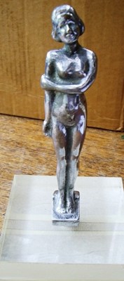 Lot 64 - female nude motoring mascot