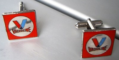 Lot 39 - A pair of Valvoline cufflinks