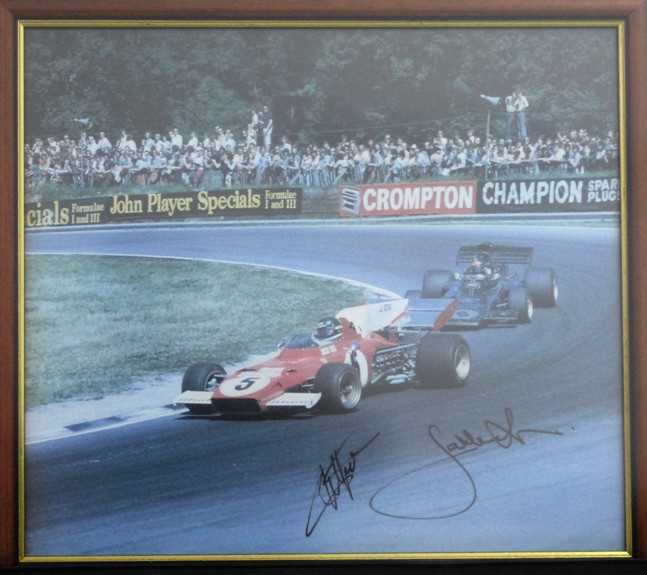 Lot 44 - A framed and glazed print showing Emerson Fittipaldi